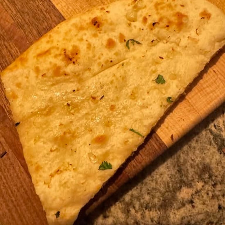 Savor our authentic naan
